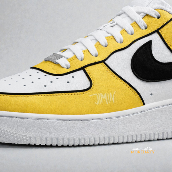 BT21 Chimmy AF1 side detail showing yellow and black design with black Nike swoosh