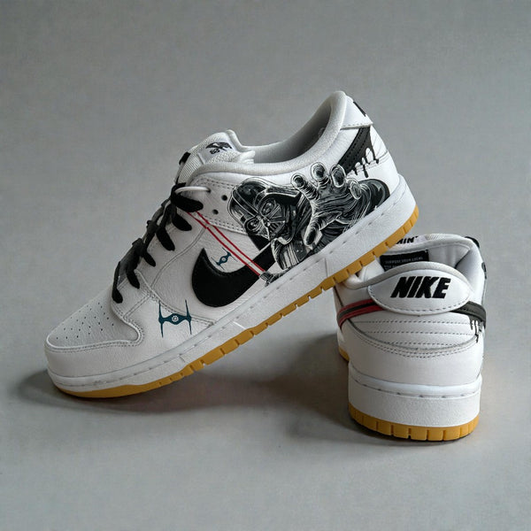 Custom Star Wars Nike Dunk Low sneakers with hand-painted Darth Vader reaching artwork, black swoosh, red lightsaber accents, and gum outsole.