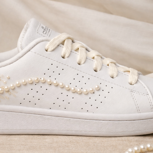 The Silent Conspiracy wedding sneaker – Adidas Advantage with trailing pearl embellishments close-up