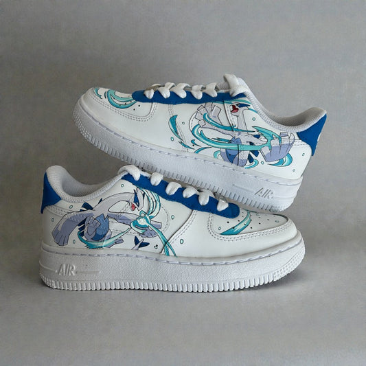Custom hand-painted Nike Air Force 1 sneakers inspired by anime aesthetics, featuring dynamic blue-and-white illustrated character artwork with flowing motion effects, painted by hand on a white leather base and photographed in a stacked side profile.