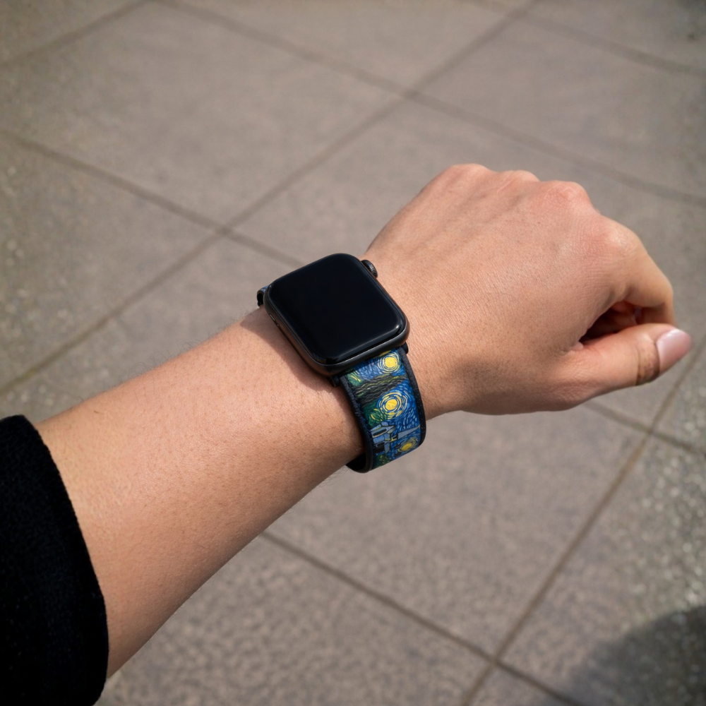 Hand-painted custom watch strap by Moreiarty worn on wrist