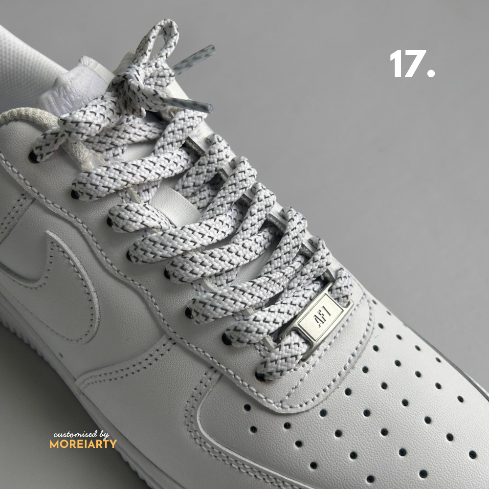 Multi-colour reflective laces showing light-up effect on sneaker