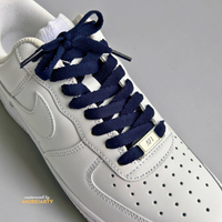 Moreiarty flat lace detail showing sealed aglet on sneaker