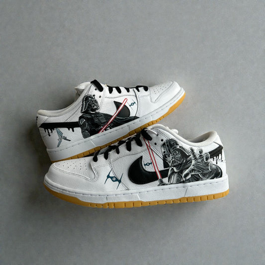 Star Wars custom Nike Dunk Low with Darth Vader illustration and red lightsaber design.