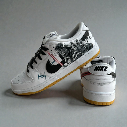 Custom Star Wars Nike Dunk Low sneakers with hand-painted Darth Vader reaching artwork, black swoosh, red lightsaber accents, and gum outsole.