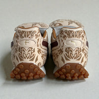 Maori x Puma Fenty sneaker side panel showing detailed Maori artwork