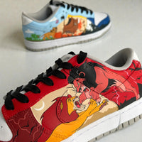 Close-up detail of custom hand-painted Nike Dunk Low sneakers inspired by Disney’s The Lion King, showcasing a hand-painted illustration of Simba and Scar on premium leather with bold red and savanna tones.