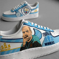 Custom Manchester City Nike Air Force 1 sneakers featuring hand-painted Pep Guardiola portrait, Treble Winners text, club crest, and sky-blue detailing.
