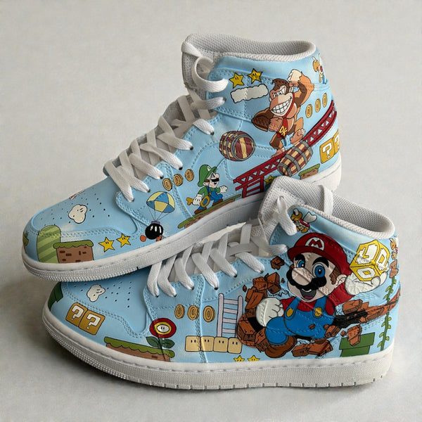 Custom hand-painted Nike Air Jordan 1 Mid sneakers inspired by Nintendo’s Super Mario universe, featuring detailed illustrations of Mario, Donkey Kong, Luigi, coins, ladders, and retro game elements, painted by hand on a sky-blue leather base.