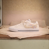 The Midnight Letter bridal sneaker – layered florals and pearl clusters on Nike Court Legacy by Moreiarty