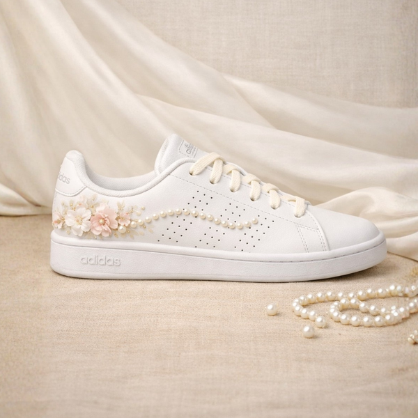 The Silent Conspiracy – tonal florals and pearl arc on Adidas Advantage, hand-painted bridal sneaker by Moreiarty