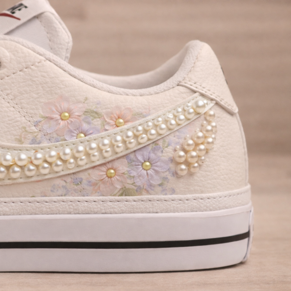 The Midnight Letter wedding sneaker – Nike Court Legacy with floral pattern and pearl accent detail